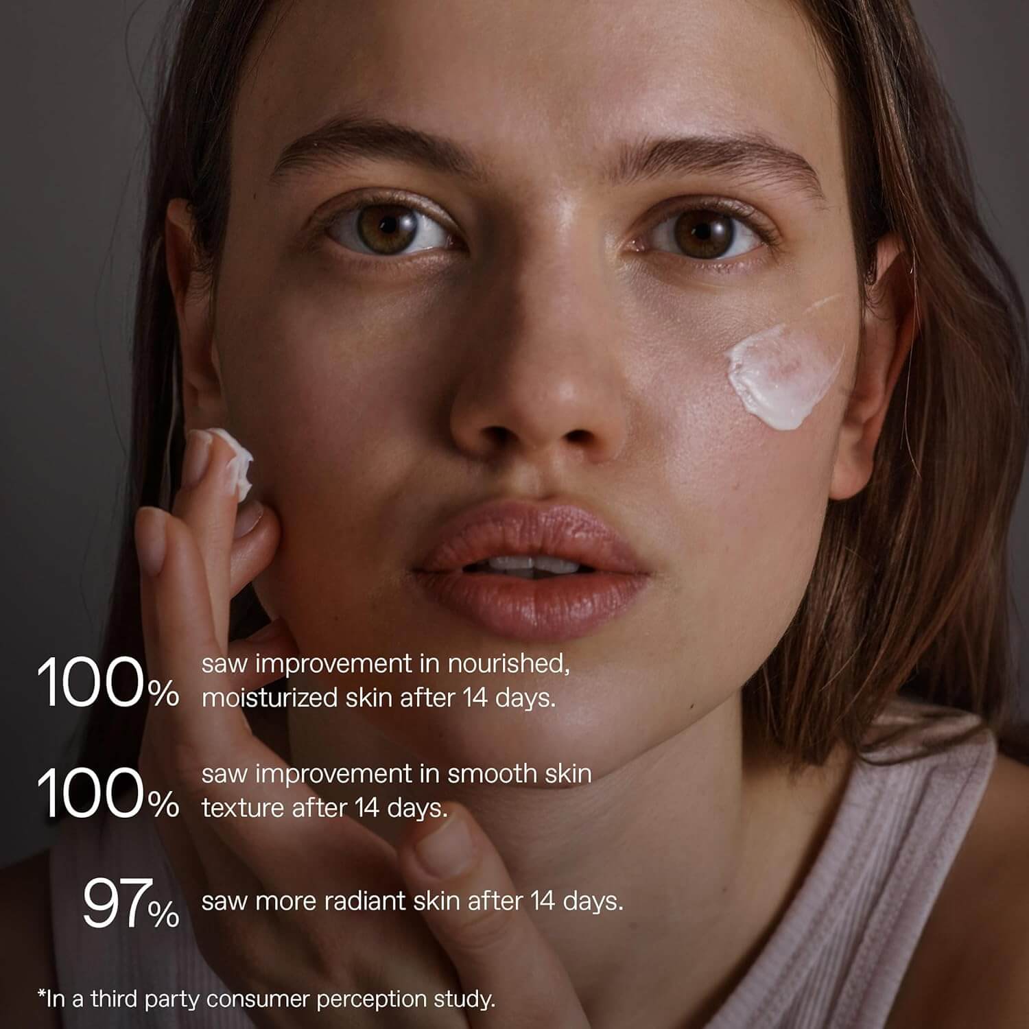 Woman applying Korres cream to her face with text about skin improvement after 14 days.