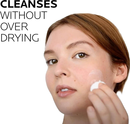Woman applying a La Roche-Posay product with text 'CLEANSSES WITHOUT OVER DRYING' on a white background