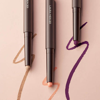 Laura Mercier Caviar Stick Eye Colour Matte in various shades on a soft background, showcasing effortless beauty.