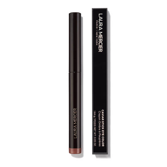 Laura Mercier eyeliner stick and packaging on a white background