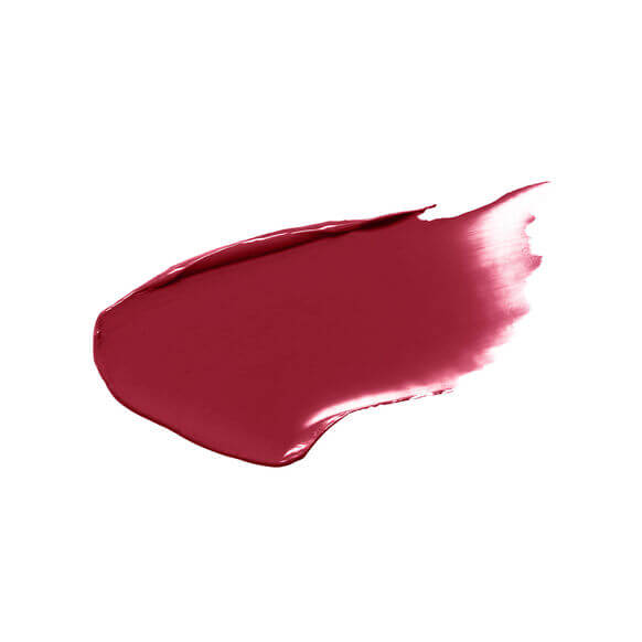 Swatch of Laura Mercier Rouge Essentiel Silky Crème Lipstick in vibrant Rouge Ultime shade.