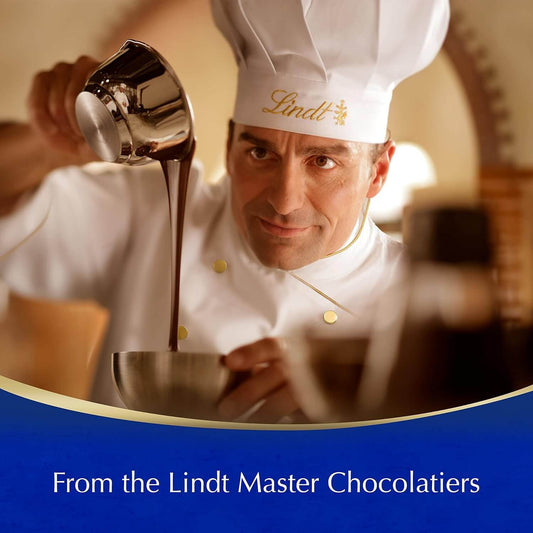 Chef pouring chocolate into a bowl with 'Lindt' branding.