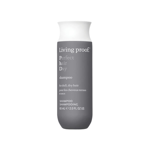 Living Proof shampoo bottle on a white background