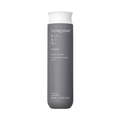 Living Proof shampoo bottle on a white background
