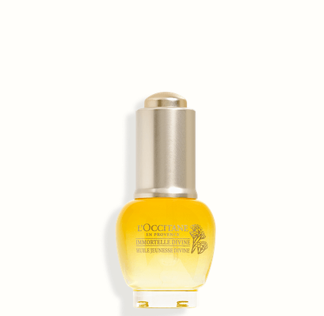 L'Occitane Immortelle Divine Youth Oil 15ml bottle for skin rejuvenation and anti-aging benefits.