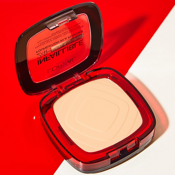 L'Oreal Compact powder in a red case on a red and white background