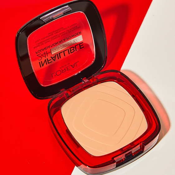 L'Oreal Compact powder in a red case on a red and white background