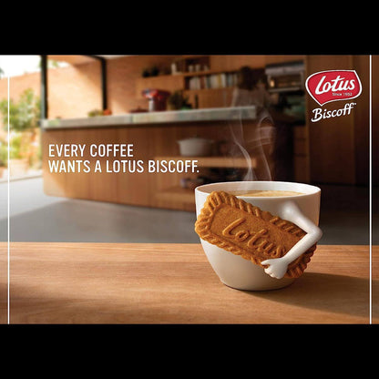 A steaming cup of coffee with a Lotus Biscoff biscuit, emphasizing the perfect coffee pairing.