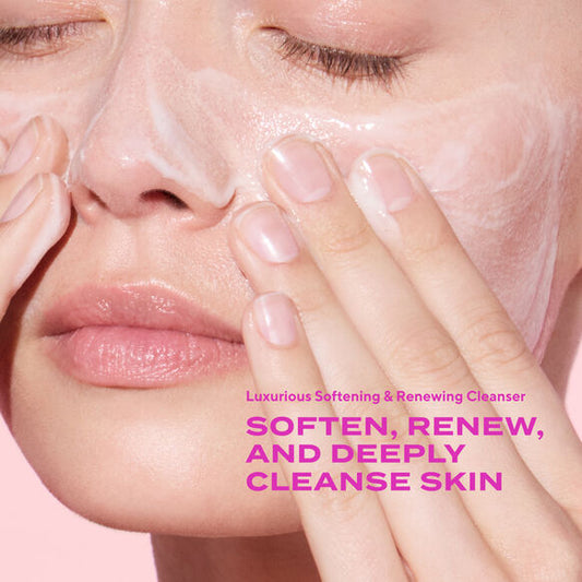 Woman applying Murad cleanser to her face with text about luxurious skin care product.