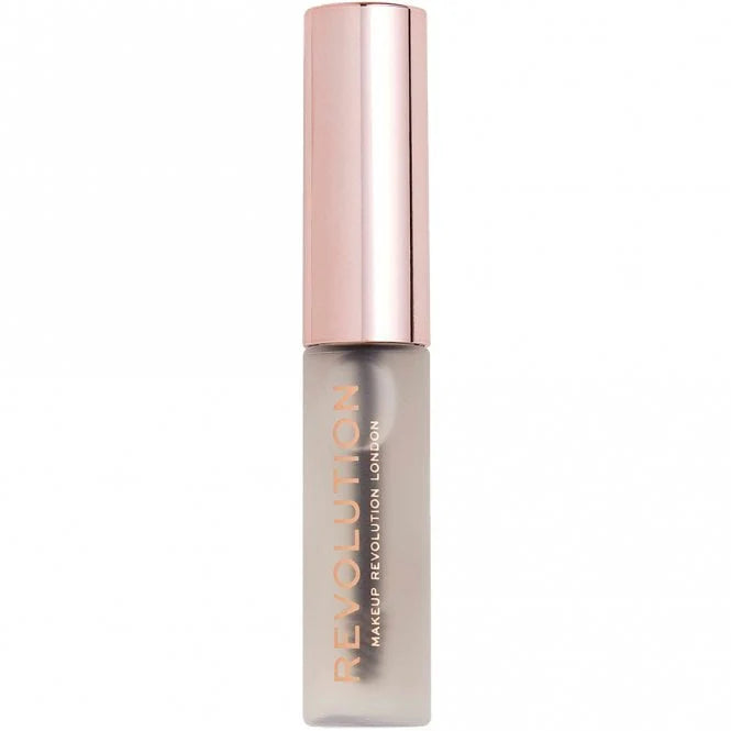 Makeup Revolution lip product with rose gold cap on white background