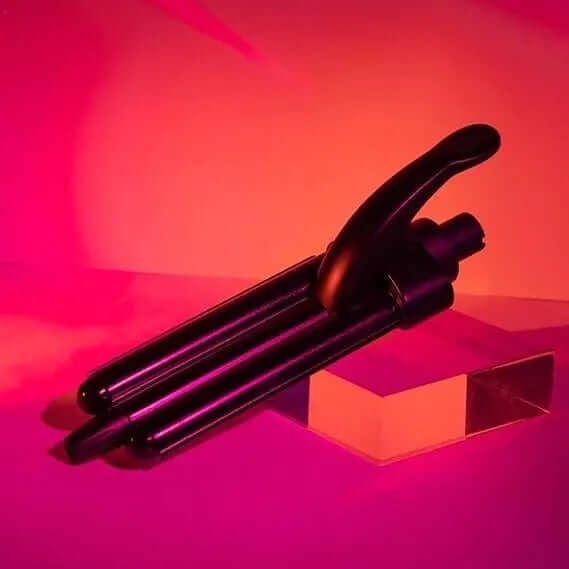 Mark Hill Pick 'N' Mix Mini Mermaid Waver on a colorful background, showcasing its compact design for easy styling.