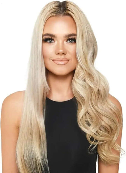 Model with long, wavy blonde hair showcasing glamorous curls created by a styling tool.