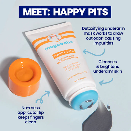 Megababe Happy Pits detoxifying underarm mask with applicator on a light blue background