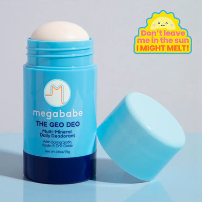 Blue deodorant stick with 'megababe' branding on a light gray background