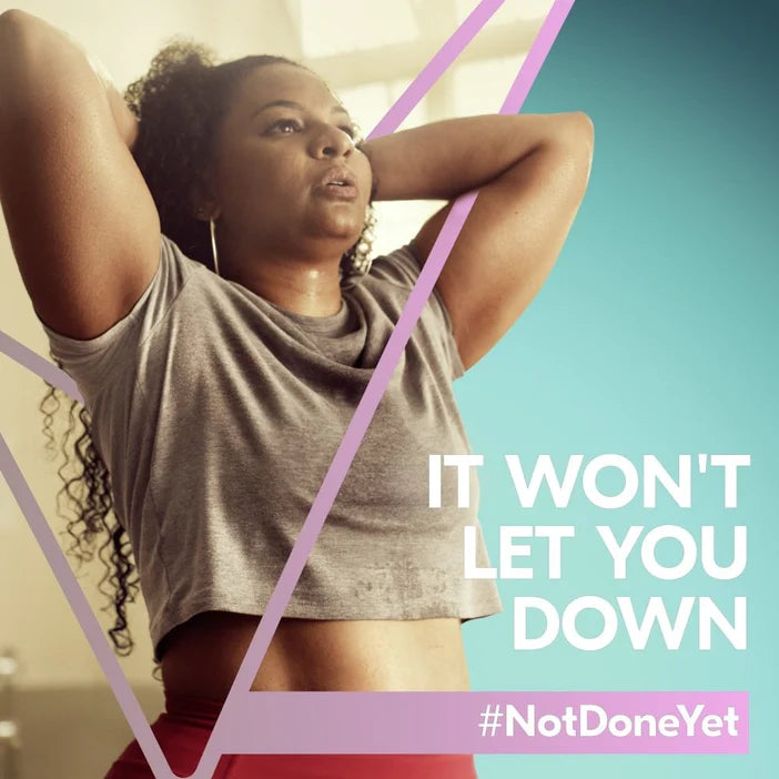 Woman exercising with motivational text Sure 'IT WON'T LET YOU DOWN' and '#NotDoneYet' on a colorful background