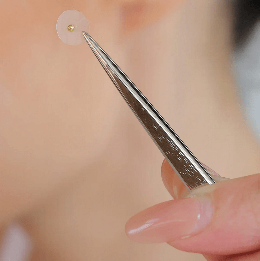 Muihood 24K Gold Plated Ear Seed Kit showcasing ear seed application with tweezers for wellness.