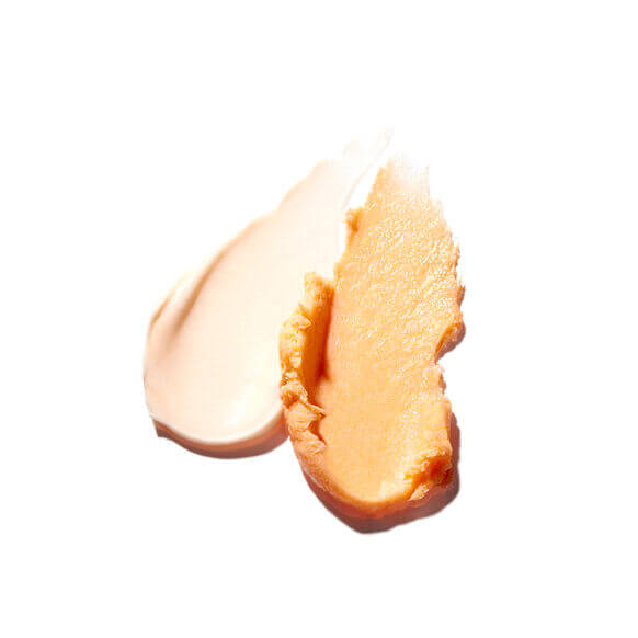 Close-up of a beige Murad cosmetic product on a white background