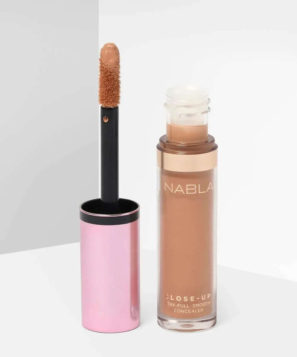 NABLA Close Up Concealer in a tube with applicator, showcasing creamy formula for full coverage and natural finish.