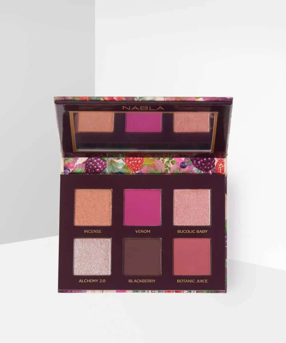NABLA Cutie Palette Wild Berry showcasing six vibrant shades in soft pink and purple hues for versatile eye makeup looks.