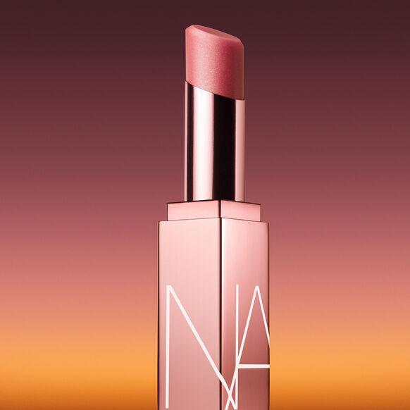 NARS Lipstick with NARS logo on a gradient background