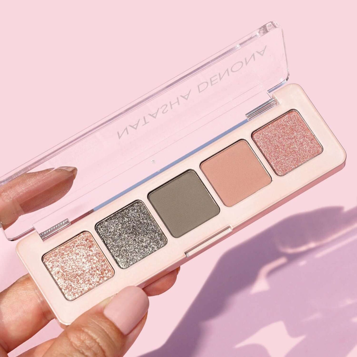 Natasha Denona Retro Mini Palette showcasing five glamorous eyeshadow shades in a stylish compact.