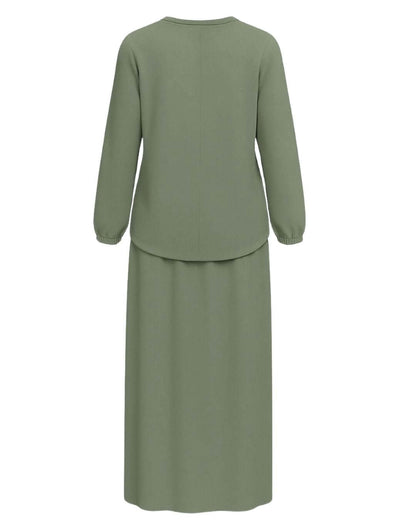 Back view of NED Sage Green Modest Satin Skirt Set featuring a high-low blouse and maxi skirt.