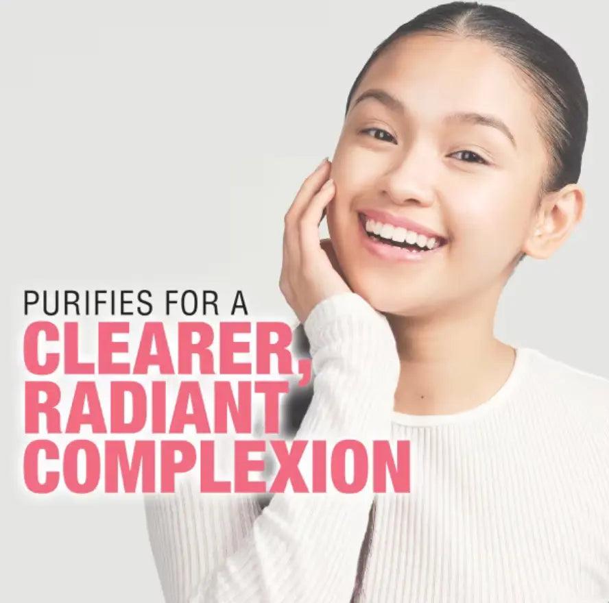 Smiling young woman with clear skin promoting Neutrogena Refreshingly Clear Daily Exfoliator for radiant complexion.