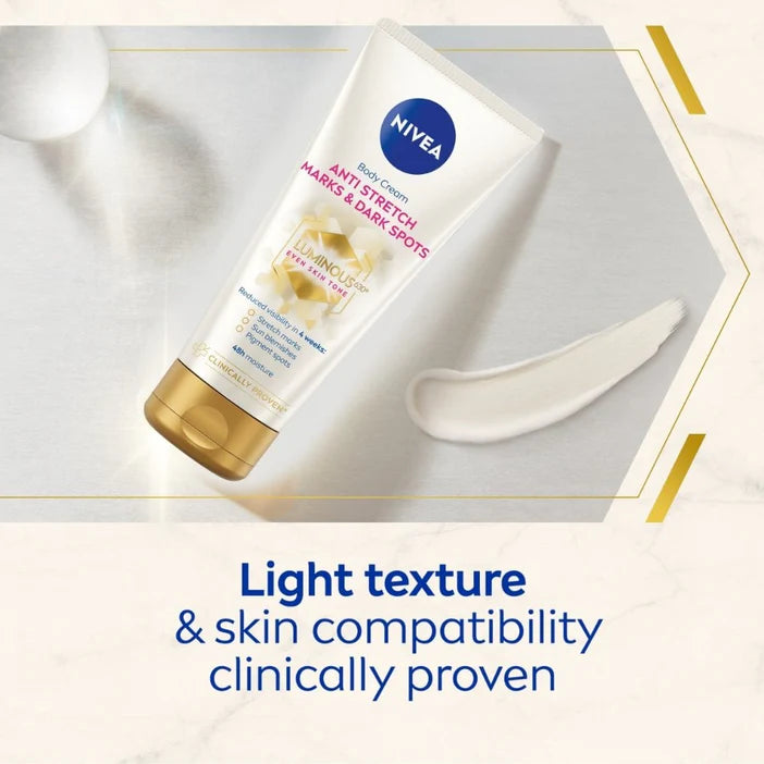 Nivea body cream for stretch marks and dark spots on a light background