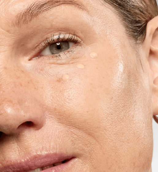Close-up of a No7 woman's face with visible skin texture and pores.