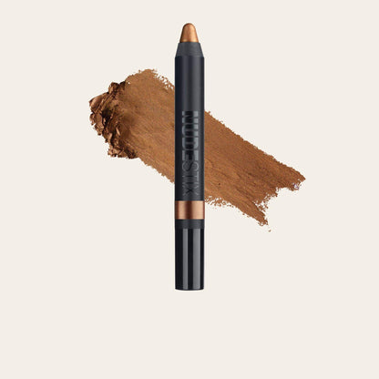 NUDESTIX Magnetic Luminous Eye Colour in Burnish with brown pigment swatch on light background.