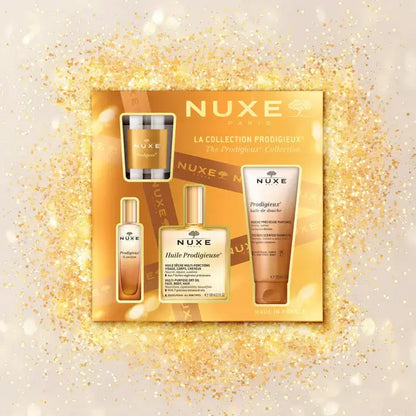 Nuxe The Prodigieux Collection Gift Set featuring four luxurious beauty products on a sparkling gold background.