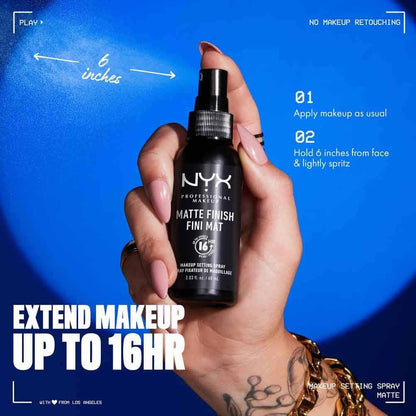 Hand holding a NYX makeup setting spray with text on a blue background