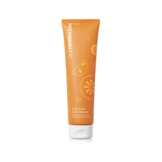 Orange tube of Ole Henriksen Truth Juice Daily Cleanser on a white background