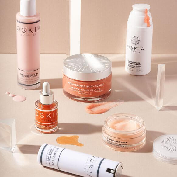OSKIA skincare products on a beige background