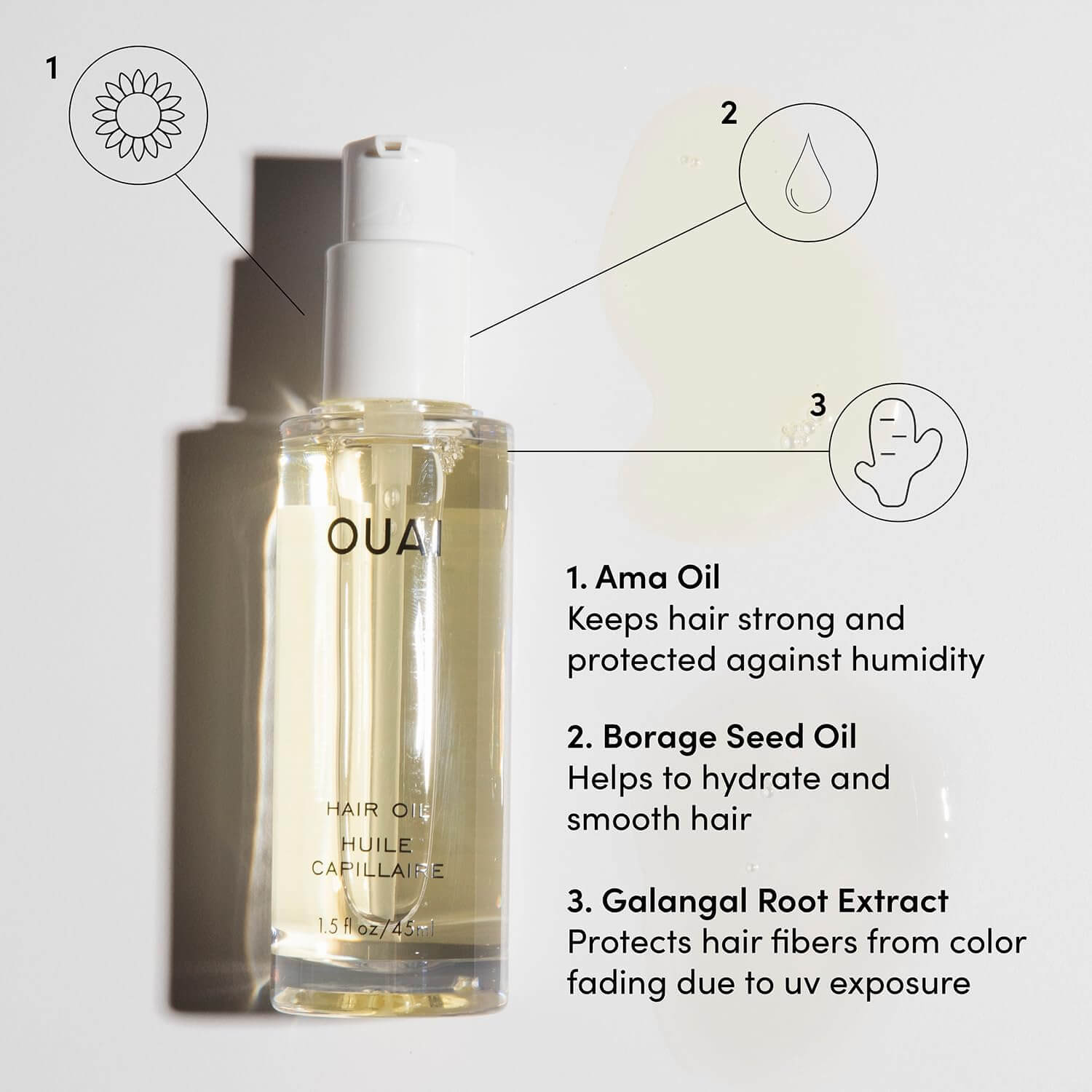 OUAI hair oil bottle with features labeled on a light gray background