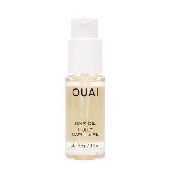 OUAI hair oil bottle on a white background