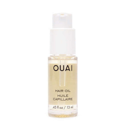 OUAI hair oil bottle on a white background