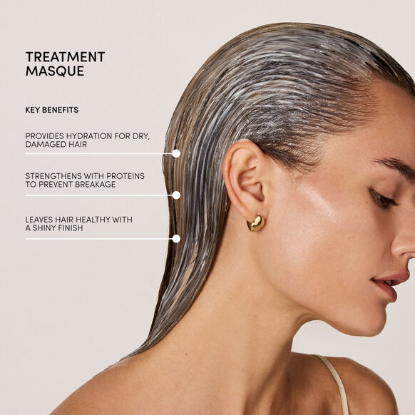 Woman with treated hair showing key benefits of OUAI treatment masque on a beige background