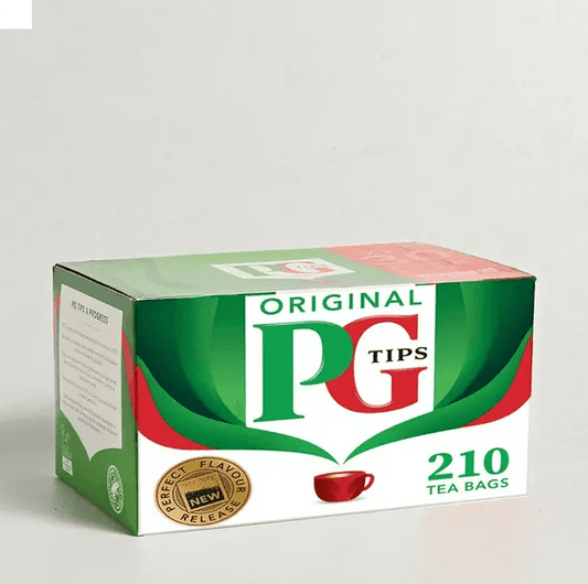 PG Tips Original Tea Bags packaging featuring 210 bags, offering refreshing and flavorful tea.