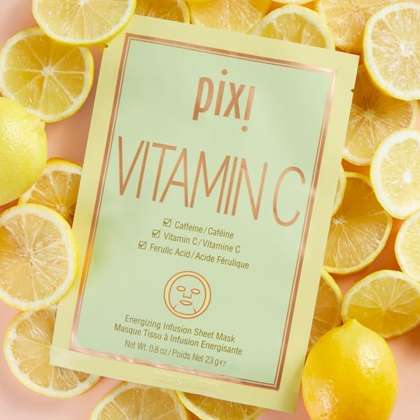  PIXI Vitamin C sheet mask surrounded by sliced lemons on a pink background