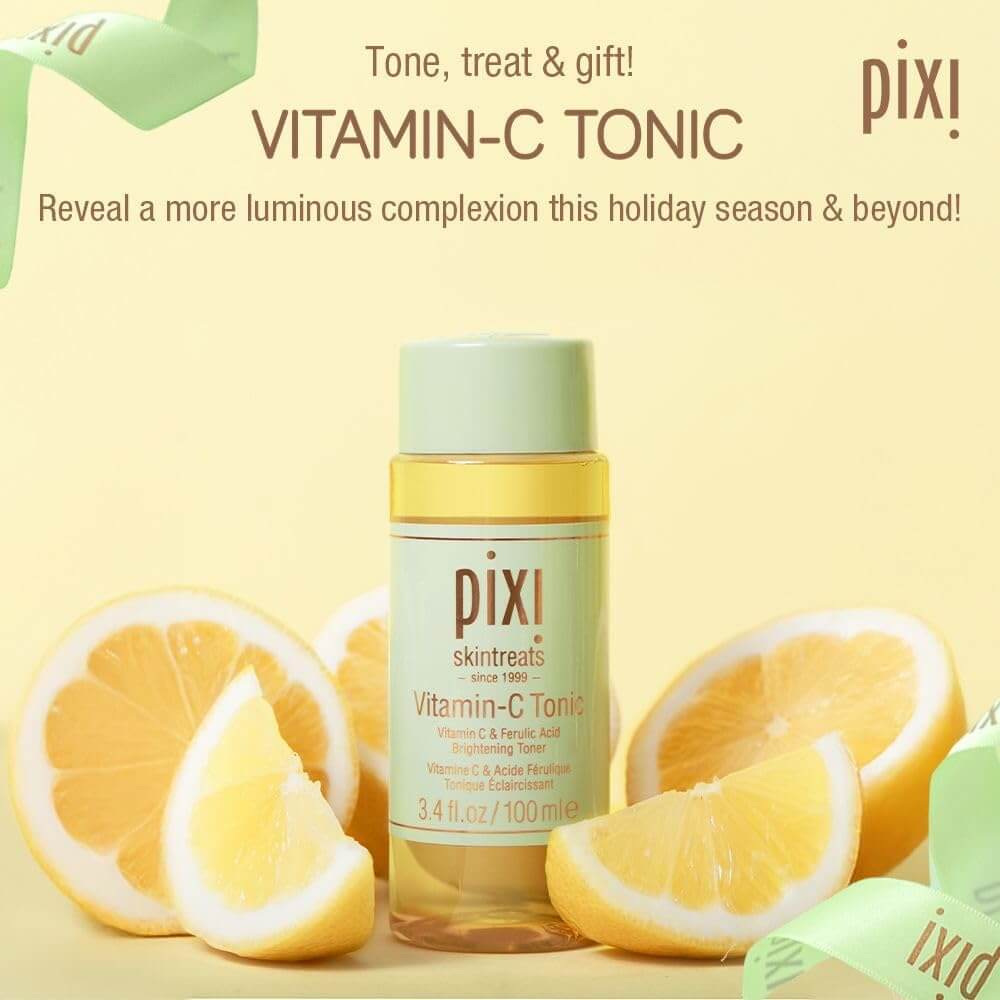 Pixi Vitamin-C Tonic bottle with lemon slices on a yellow background