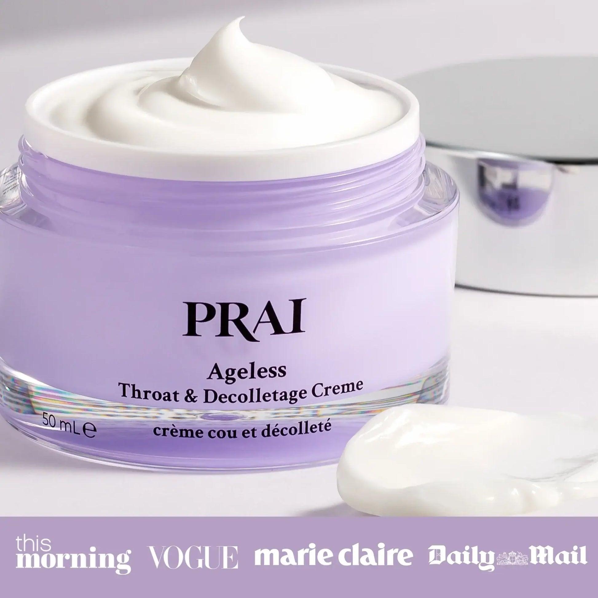 Purple jar of PRAI Ageless Throat & Decolletage Creme with a white cap on a light gray background.