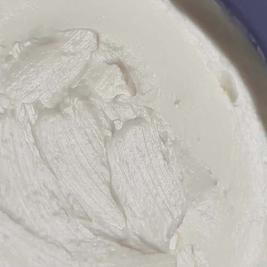 Close-up of Sol de Janeiro Delicia Drench Body Butter, creamy texture for soft, hydrated skin.