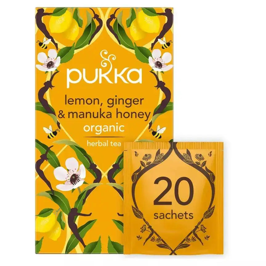 Pukka Organic Lemon, Ginger & Manuka Honey herbal tea sachets package with 20 sachets for soothing and aromatic tea.
