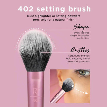 Real Techniques Makeup brush with pink handle and bristles on a pink background, featuring text about its use and features.