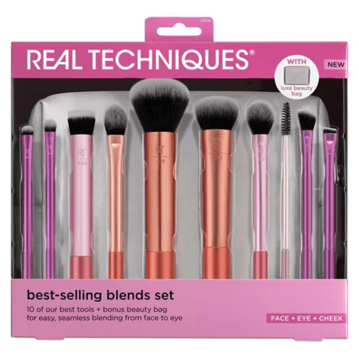 Real Techniques makeup brush set packaging with pink and rose gold brushes.