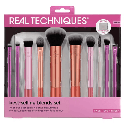 Real Techniques makeup brush set packaging with pink and rose gold brushes.