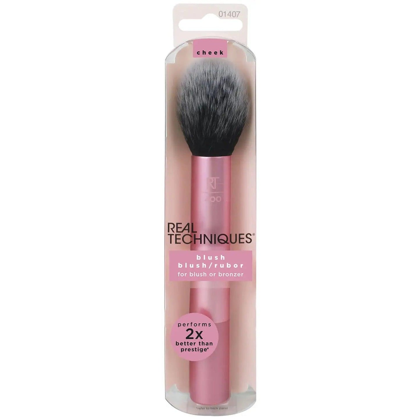 Real Techniques Blush Brush with fluffy bristles for seamless application of blush and bronzer in a sleek packaging.