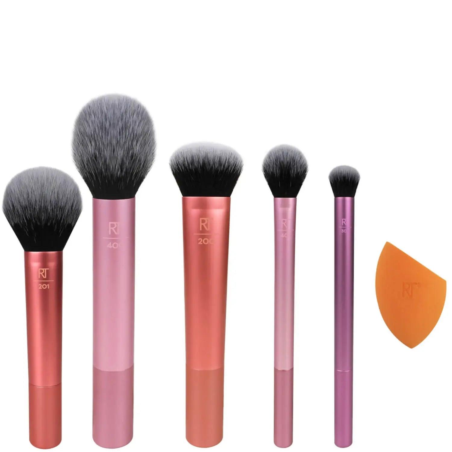 Real Techniques Everyday Essentials and Powder Brush Bundle featuring five makeup brushes and a blending sponge.