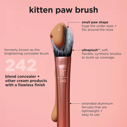 Makeup brush with brown concealer on a pink background, labeled 'kitten paw brush' with product details.